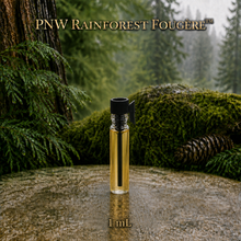PNW Rainforest Fougère perfume concentrate sample vial with yellow liquid on a pale rock in a wet Pacific Northwest evergreen forest - 1ml Vial