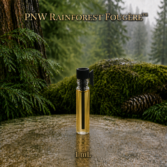 PNW Rainforest Fougère perfume concentrate sample vial with yellow liquid on a pale rock in a wet Pacific Northwest evergreen forest - 1ml Vial