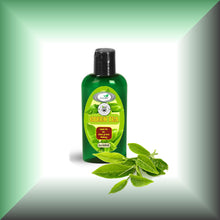 Green Tea Seed Oil for Face, Skin, Hair & Massage - Virgin, in a 2 fl oz bottle with dispenser cap.
