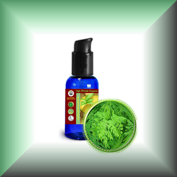 Moringa Leaf Oil Extract for Face, Skin, Hair & Massage, in a 1 fl oz bottle with pump dispenser.