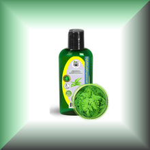 Moringa Leaf Oil Extract for Face, Skin, Hair & Massage, in a 2 fl oz bottle with dispenser cap.